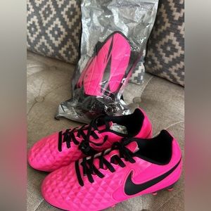 Kids soccer cleats and shin guards
